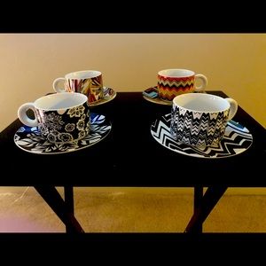 4 cup and saucer sets or 8 pieces